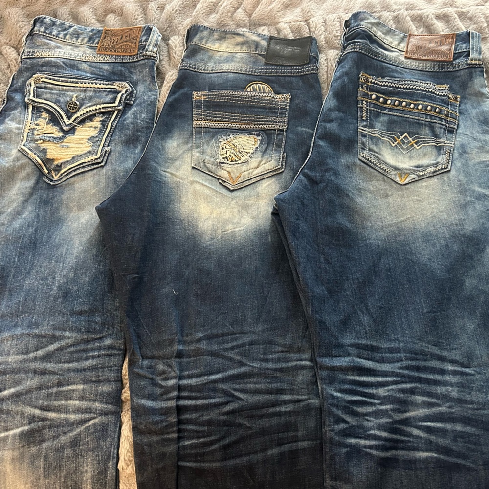 Three pairs of men’s Affliction jeans